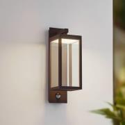 Lucande udendørs LED-væglampe Ferdinand, rust, sensor, IP54
