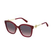 Røde solbriller med brune pink skygge linser