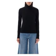 Sort turtleneck top med gyldne snap-knapper