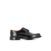Klassiske sorte flade sko i læder