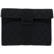 Pre-owned Canvas clutches