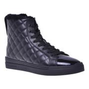 Trainers in black quilted leather and patent leather