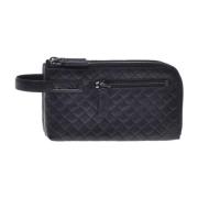 Wallet in black woven print leather