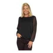 Stilfuld prikket bluse