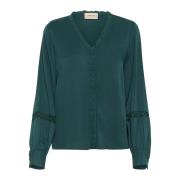 Elegant V-hals Bluse med Broderede Detaljer