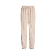 Moderne ankellange sweatpants med dekorative detaljer