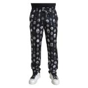 Elegant silke joggers med religiøst print