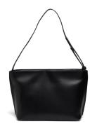 Embossed Logo Medium Tote Calvin Klein Black