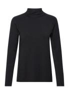 W Magic Rollneck Peak Performance Black