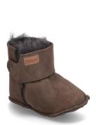 Booty? Sheapskin Pom Pom Brown