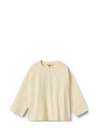 T-Shirt L/S Kax Tops T-shirts Long-sleeved T-Skjorte Beige Wheat