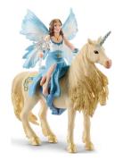 Schleich Eyela Riding On Golden Unicorn Toys Playsets & Action Figures...