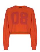 Cropped Long-Sleeved T-Shirt Tops T-shirts & Tops Long-sleeved Orange ...